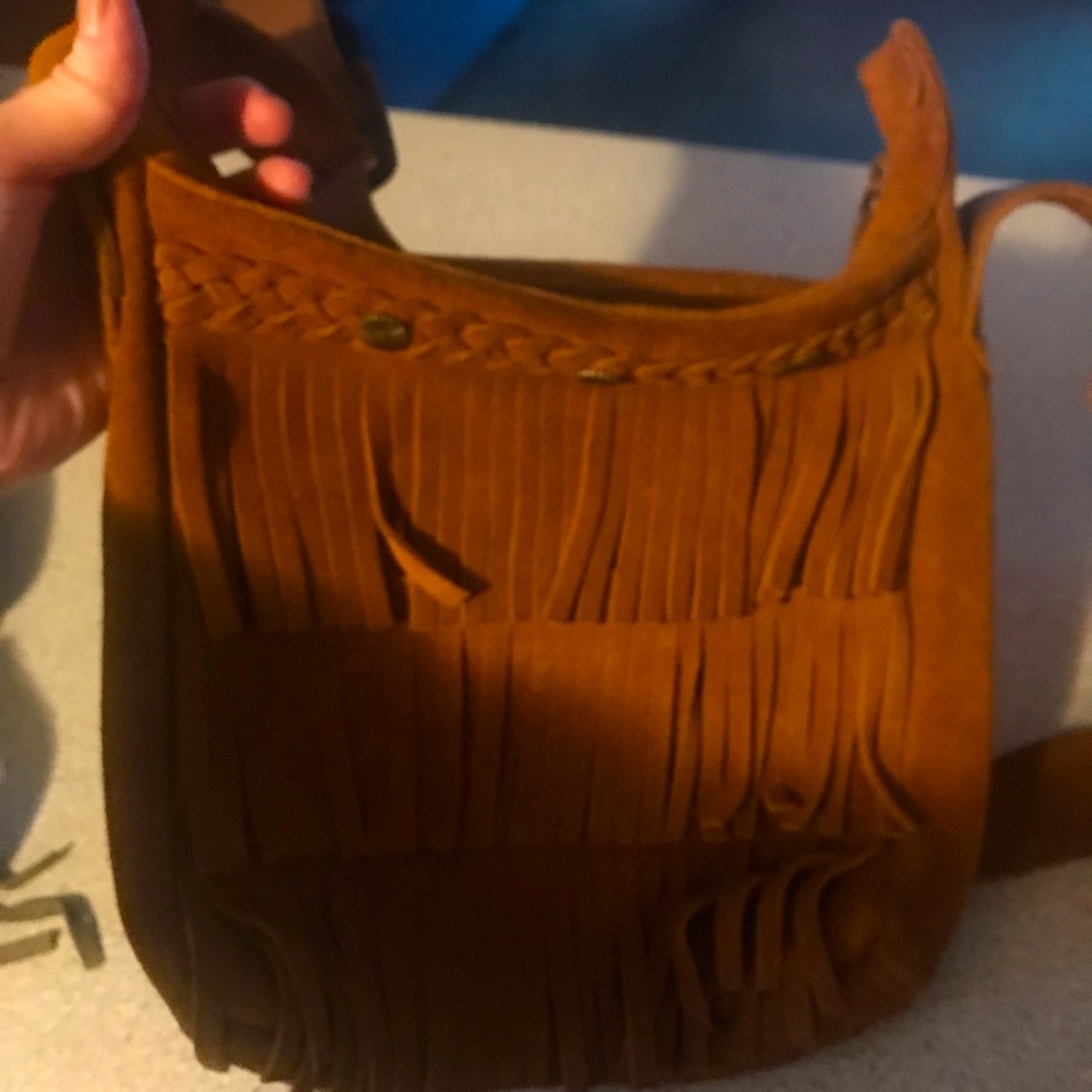 Beautiful Minnetonka bag medium size with zip crossbody suede